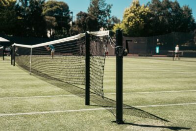 Detailed view of a tennis net on a sunny day at Toorak tennis court in Australia.